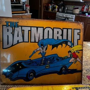 Tin Batmobile sign in plastic